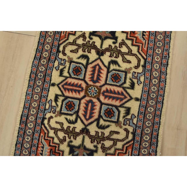 An authentic vintage tribal Meshkin rug hand-knotted with fine wool and natural dyes. This rug features a geometric...