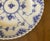 total of 8 available; hand painted cobalt blue floral motifs; distinctive ribbed (fluted) texture hand pierced open work...