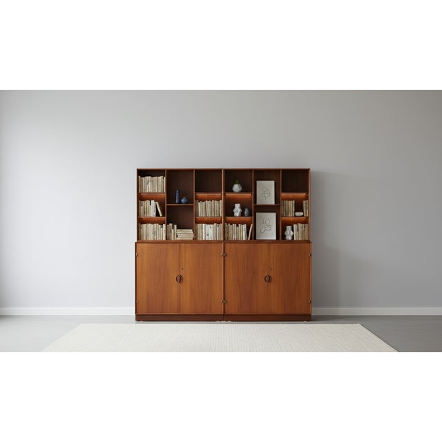 Exceptional and rare wall unit designed by Peter Hvidt & Orla Mølgaard-Nielsen for Søborg Møbelfabrik in the 1950s....