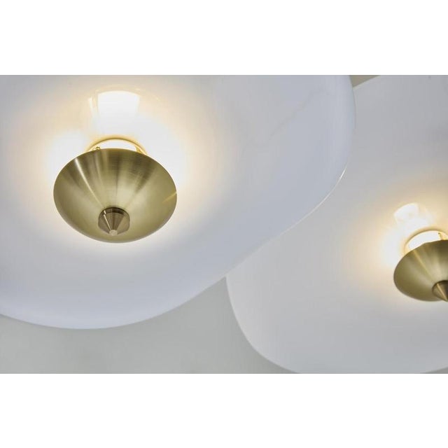 Curve echappée verre pendant lamp by jennifer midoz dimensions: d 47 x w 60 x h variable cm materials: white opaline, and...