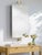 The Anastasya Mirror is the perfect addition to any modern home. Crafted from durable brass, this wall mounted mirror...