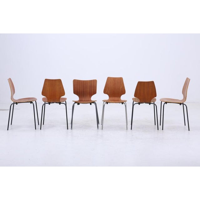 Product details vintage stackable chairs from the 1970s. The chairs vary slightly in condition and shape. Features • high-...