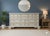 Elevate your space with this beautifully refinished Vintage Bassett dresser, known for its quality craftsmanship and...