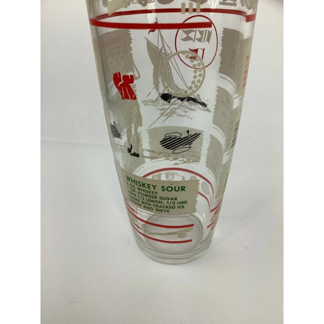 Vintage Hazel Atlas Sports Themed Recipe Cocktail Shaker. Top and bottom with various sports apparatus. The body of the...