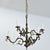 A six-light brass chandelier from 19th century Portugal, modeled after the Dutch style with a central column from which...