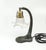 The bedside lamp comes from Austria-Hungary in 1900-1910. It was made in the Art Nouveau style. The lampshade is made of...