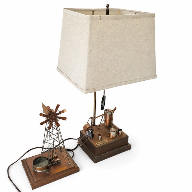 Vintage Solarts lamp. The light works, the solar unit should be replaced. All original. Windmill should be refurbished....
