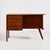 Danish teak desk from the 1960s. The desk has four drawers and an open shelf on the back. with some surface scratches,...