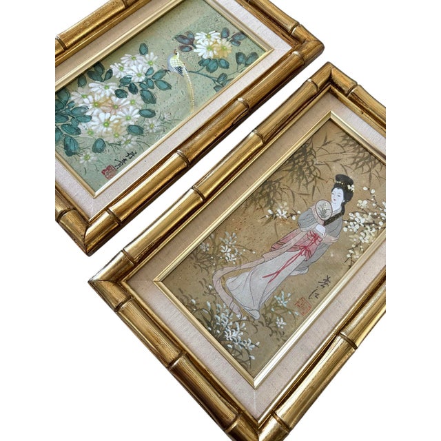 Vintage Chinoiserie artwork both framed in gold gilded faux bamboo wood frames. One piece depicts a traditional Japanese...