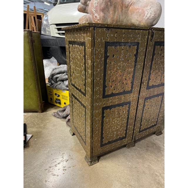 Italian 19th c brass cabinet from Torino, Italy with two doors and four drawers inside. 28”l x 16”w x 33”h 47-109