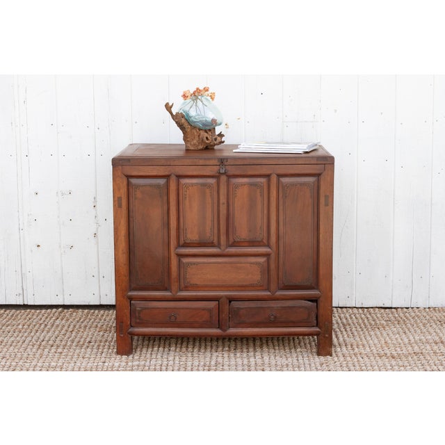 A captivating fusion of cultures, this charming French colonial blanket chest embodies centuries of artistic exchange....