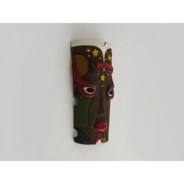 Vintage Brazilian folk art wall mask of Moura in clay Highly colorful Brazilian clay mask. A small chip at the bottom....