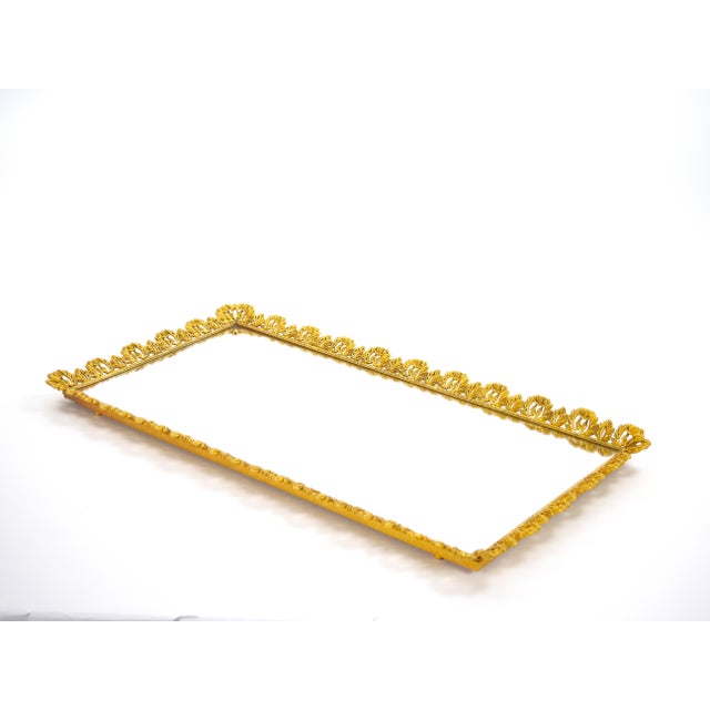 This elegant rectangular vanity or serving tray, dating to the 1970s, combines a luminous mirrored surface with a finely...
