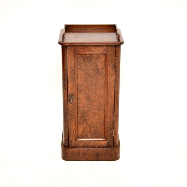 A lovely original antique Victorian burr walnut bedside cabinet. This was made in England, it dates from around 1860-1880....