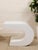 This vintage Pierre Cardin side table uses a white lacquer waterfall form to create a clean, continuous silhouette with a...