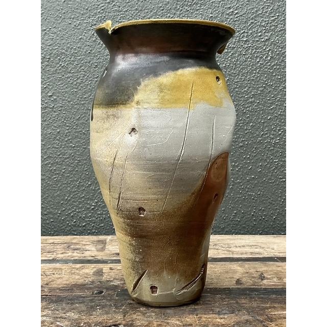 This striking original studio pottery vase is a masterclass in organic form and Brutalist texture. Hand-crafted with a...