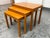 Design Plus Gallery presents a Set of Three Mid 20th Century Danish Modern Teak Nesting Tables from Bent Silberg Mobler....
