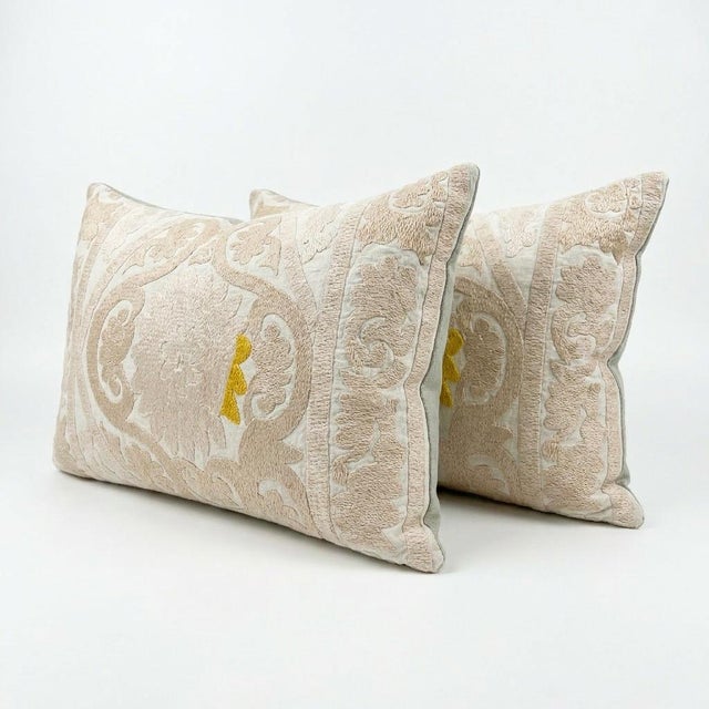 This beautiful 16'' x 22'' & 16'' x 25'' hand-embroidered Suzani pillow cover set was made from authentic Uzbek cotton...
