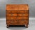 A good quality early 18th century George I walnut bureau, having a fall front opening to reveal a fully fitted interior...