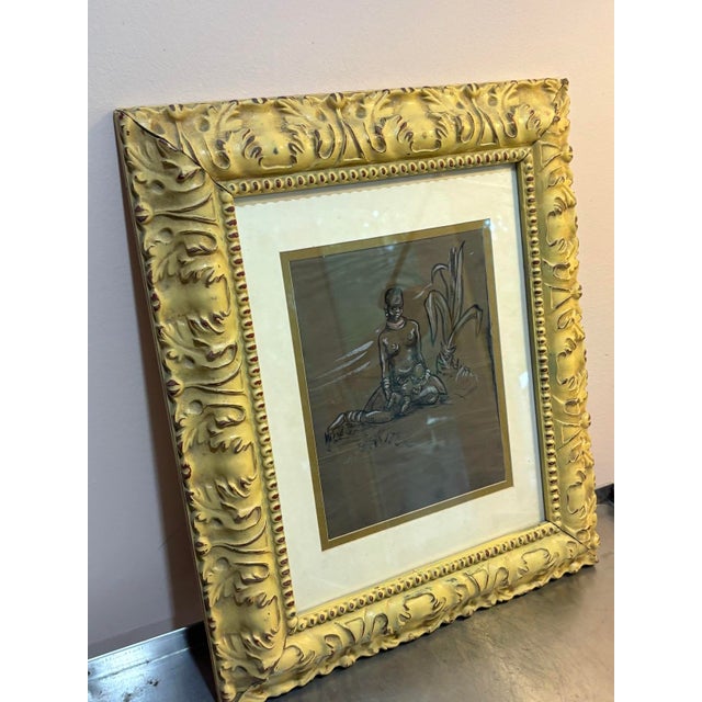 1940s-50s framed African nude woman & child drawing. Excellent condition. Measures 16" x 19" including frame.