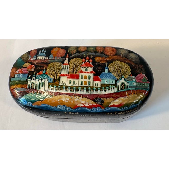 Beautifully detailed Russian hand painted trinket box and signed by the artist.
