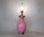Mid-Century Modern blown Scavo glass handled pink and clear table lamp by Chapman. The top and base are made out of brass....