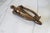 Vintage brass plated door knocker. No makers mark. Some age wear to brass finish. Hardware not included.