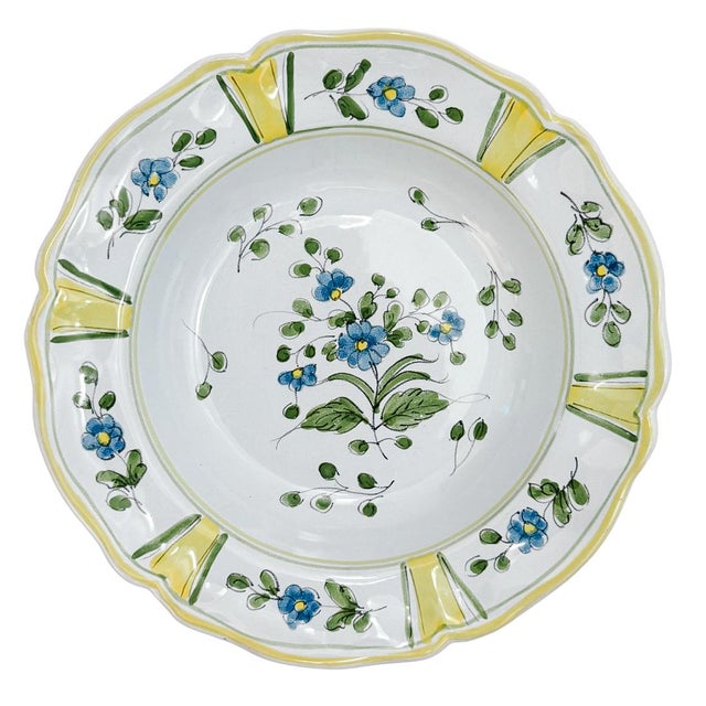 Set of four vintage majolica bowls from the Cantagalli workshop in Florence, Italy featuring a vibrant, hand-painted...