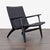 This Carl Hansen & Son lounge chair features a sleek black woven seat and back with a sturdy, angled wooden frame. The...