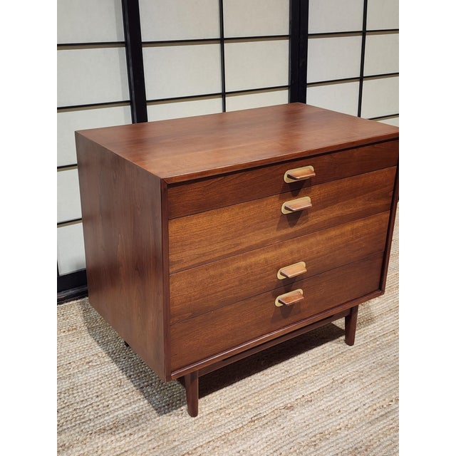 This exceptional four-drawer bachelors chest is a brilliant showcase of Jens Risom's refined American-Scandinavian design...