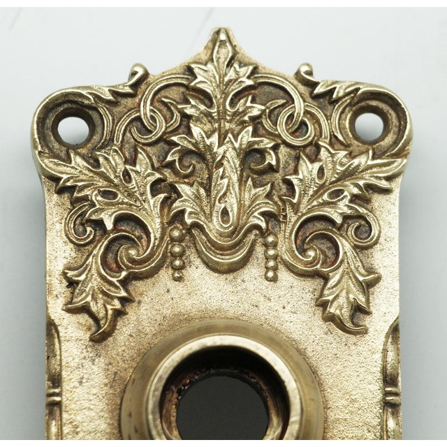 Neoclassical style cleaned and polished bronze passage door back plates. The original mounting screws are not available....