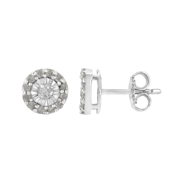 A glistening round cut diamond in a miracle setting sits at the heart of these sterling silver stud earrings. A halo of...