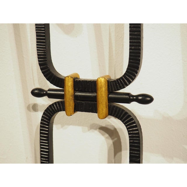 More information coming soon… Dating to around the 1920s, this large French entryway has been painted black with gilded...