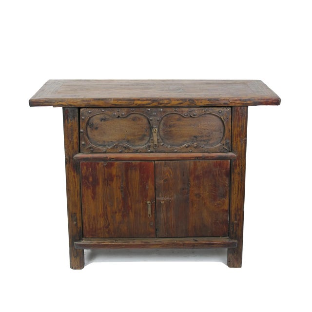 This cabinet is hand made, using traditional Chinese furniture construction and joinery and hand finished in antique brown...