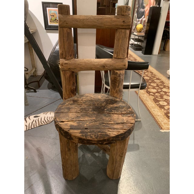 Large Substantially Built (heavy) European Primitive Distressed Log Chair.