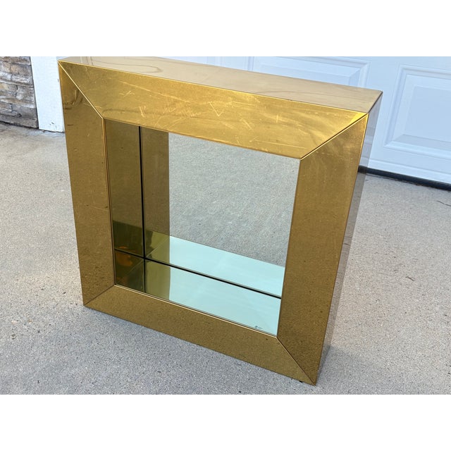 This striking vintage mirror by Artisan House founders Curtis Freiler and Jerry Fels (C. Jere). This 25 x 25 brass mirror...