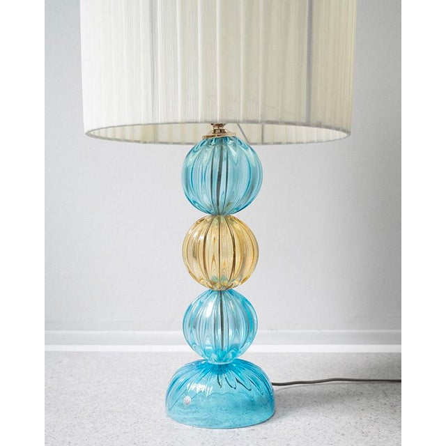 The table lamp has beautiful colored bulbs made of Murano glass. It has completely new electrical equipment - lamp holder...