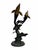 Bring the fluid energy of the ocean into your space with this magnificent vintage brass dolphin family sculpture by San...