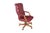 A very elegant Executive office chair upholstered in tufted brick red leather. The chair is a statement in office luxury...