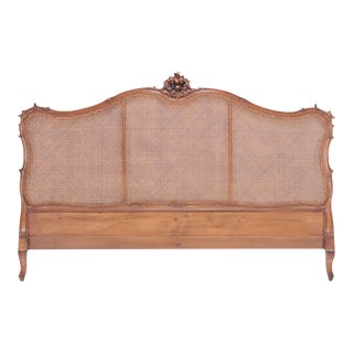 A French Louis XV Style King Size Cain Head Board With Carved Crest. Circa 1940. For Sale
