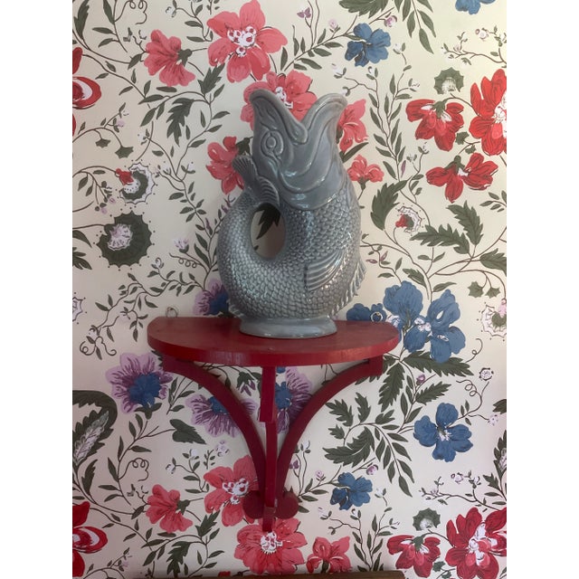 A gluggle jug wade. Stoke on Trent made in England . Great for drinking at a party your favorite ale or beer in lovely...