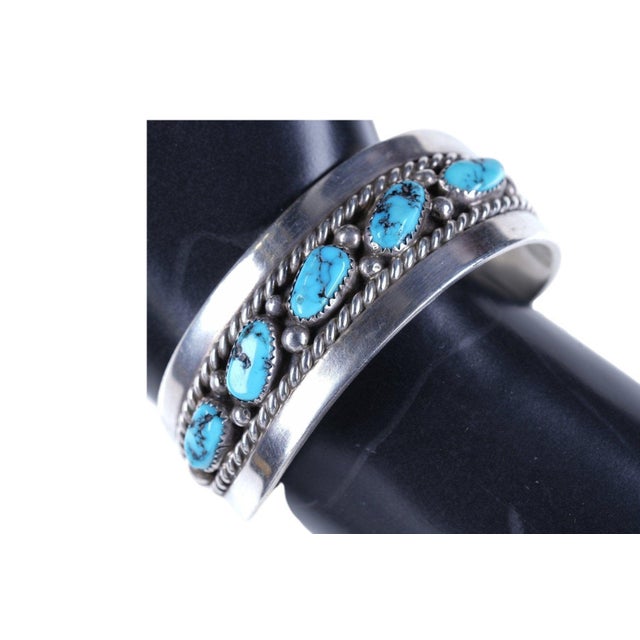 6.75" Tommy Moore Sterling Turquoise Navajo cuff bracelet 6.75" including the 1.25" gap 55.8 grams 1" wide in center, no...