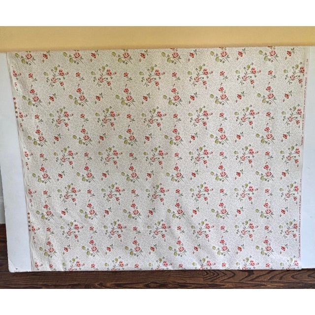 21.5 yards of screen-printed floral fabric entitled “Clover” from Osborne & Little of England.