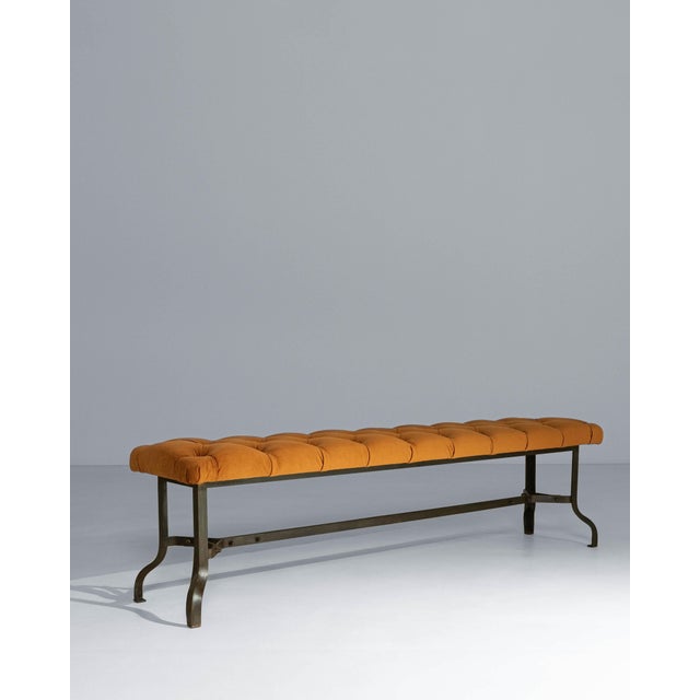 This elegant 20th century French bench combines refined industrial structure with soft, inviting comfort. The slender iron...