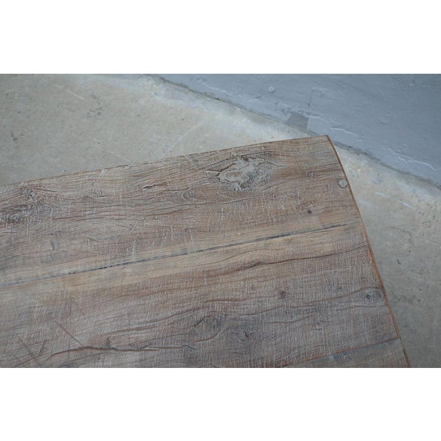 Vintage Elm Coffee Table with an Iron Base, with a beautiful thick worn elm wide plank top. The old wood and new iron form...