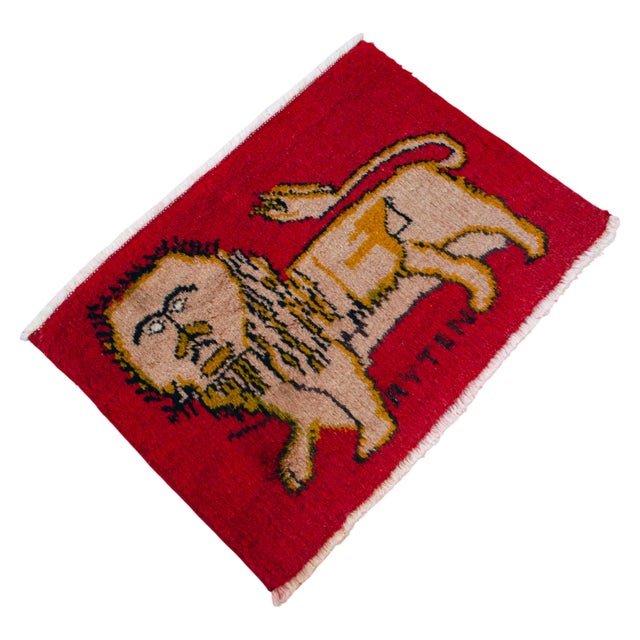 Discover the captivating charm of this small, hand-knotted Kayseri rug, featuring a striking tribal lion motif against a...