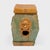 This low, ceramic garden drum is drip glazed in the manner of ancient Chinese sancai ware, cloaked in translucent shades...