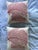 Coral (red) embroidered pillows on natural linen cotton with feather down pillow inserts. Lightly worn. no visible marks....