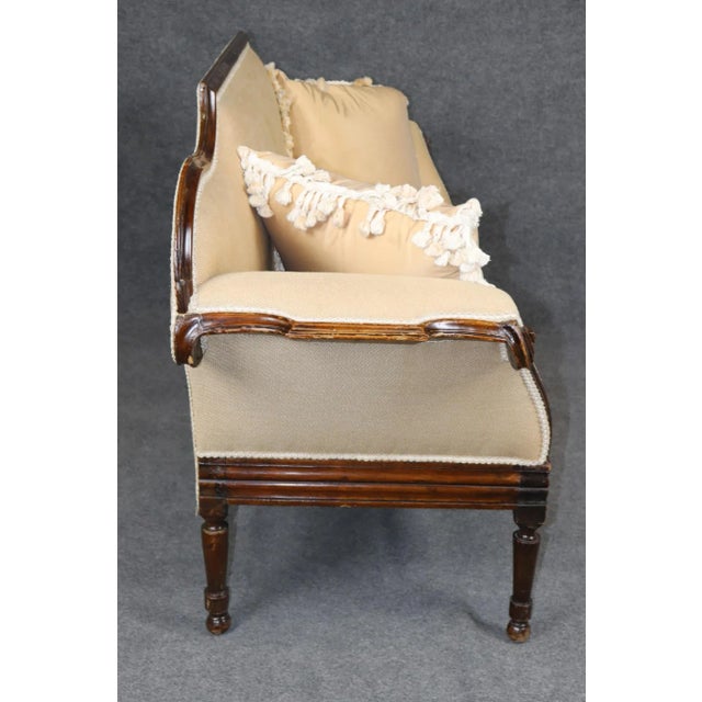 Period English Regency Mahogany Settee, Circa 1790–1820 This exceptional English Regency period mahogany settee dates from...