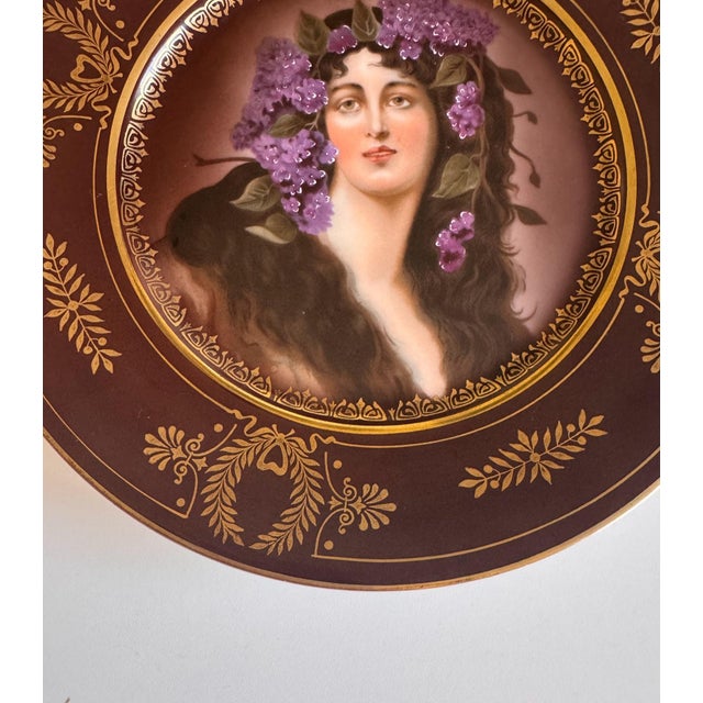 Antique Royal Vienna-style porcelain portrait cabinet plate, circa 1900–1920, featuring a classical beauty crowned with...